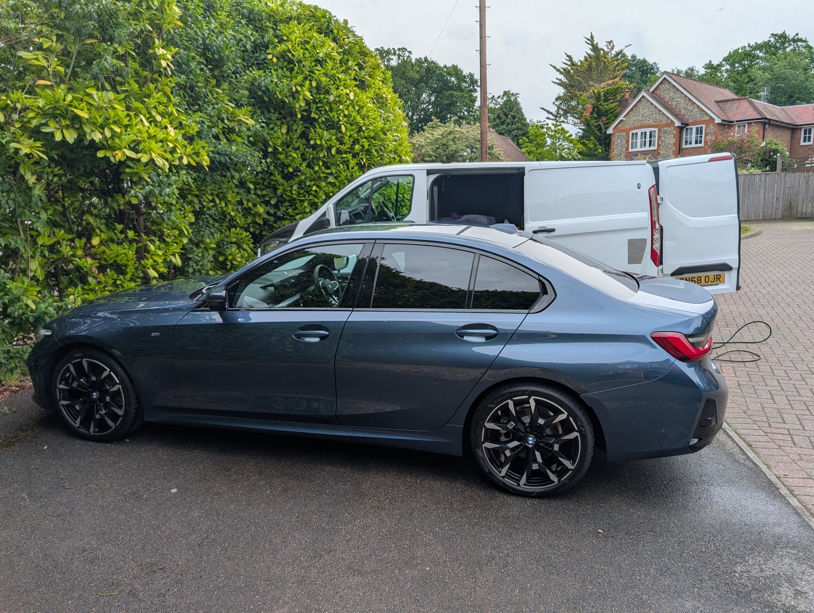 BMW 3 Series after a professional mobile valet on a residential driveway