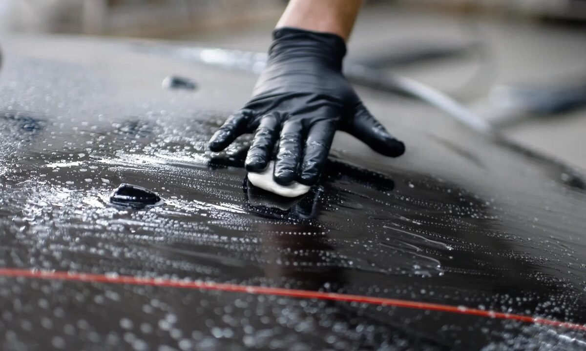 Iron fallout remover reacting on car paint turning purple