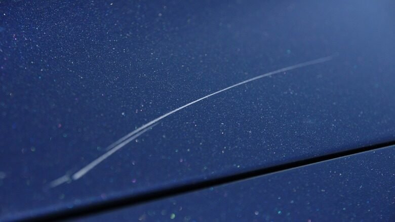Random deep scratches on car paint