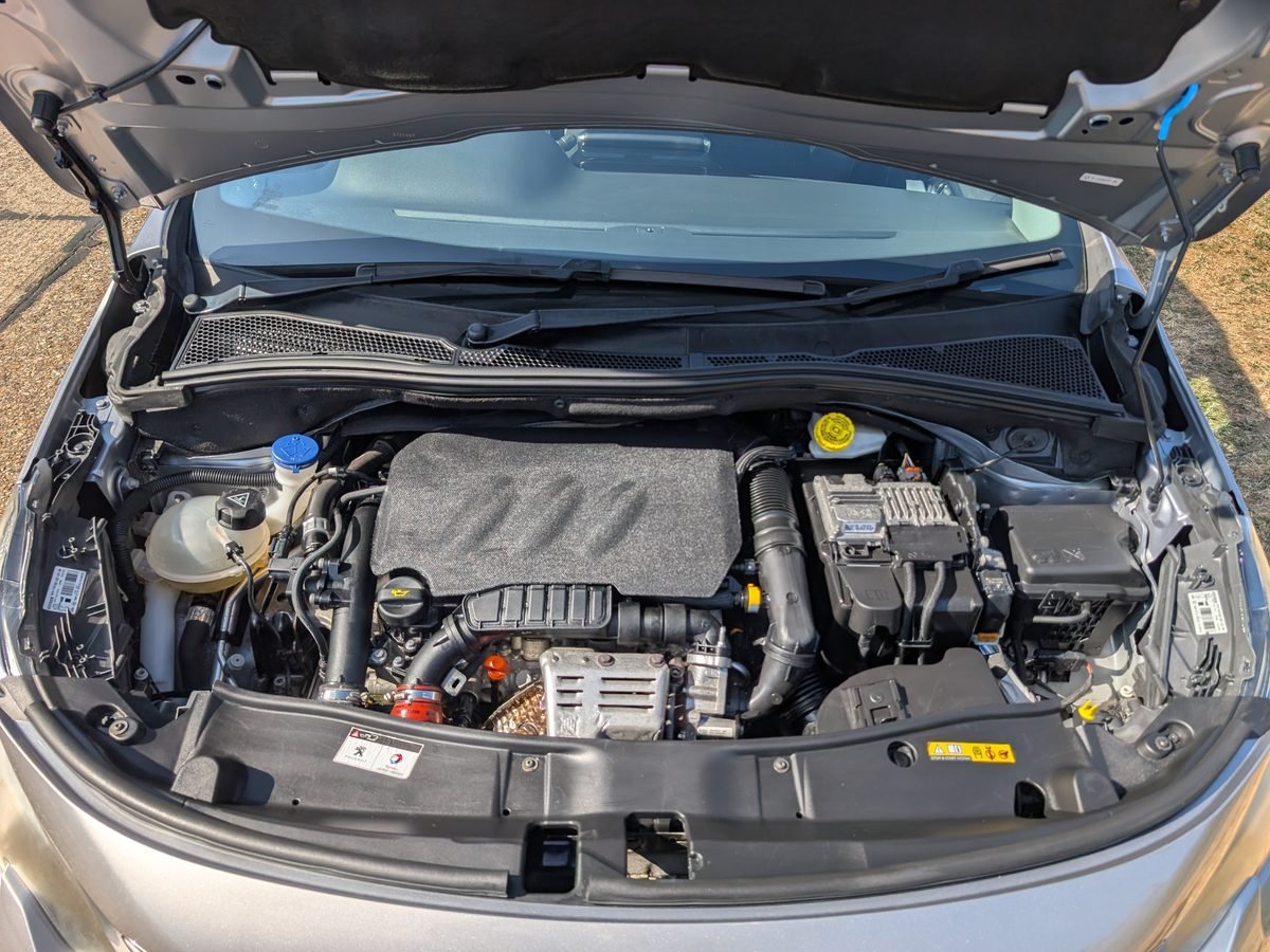 Peugeot engine bay after a professional detail, clean and dressed