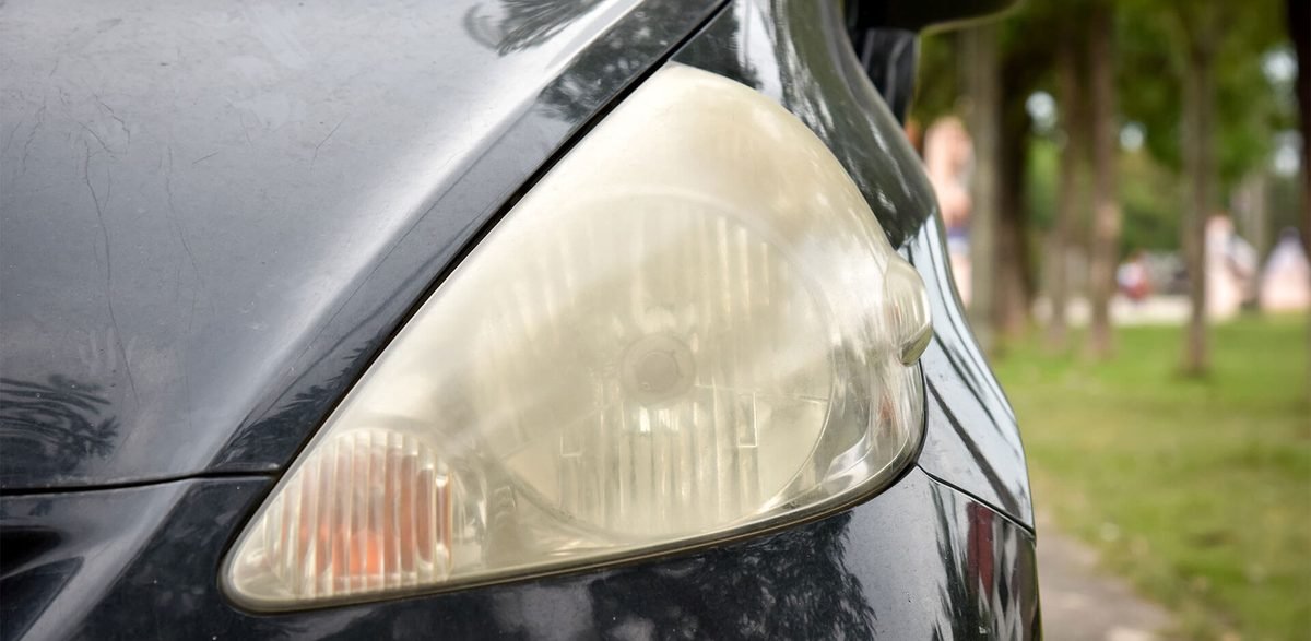 Yellowed and cloudy car headlight lens